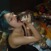 courtney-eating-a-kitten[2004].jpg