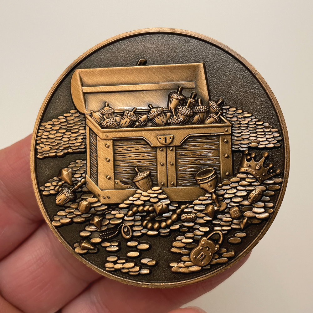 Back-of-Squirrel-Goliath-Coin-in-hand.png