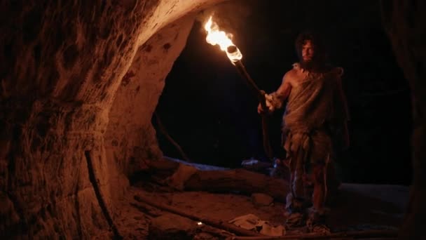 depositphotos_305598254-stock-video-primeval-caveman-wearing-animal-skin.jpg