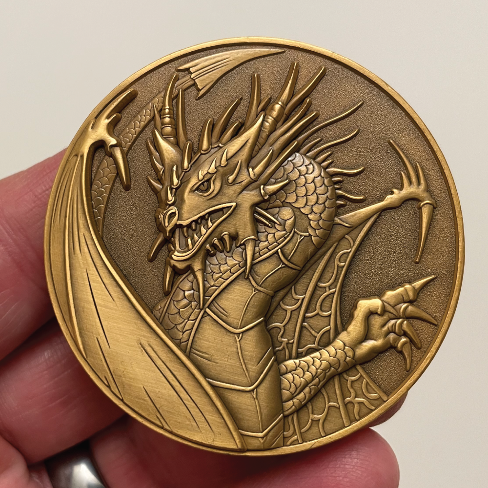 Front-of-Dragon-Goliath-Coin-in-hand.png