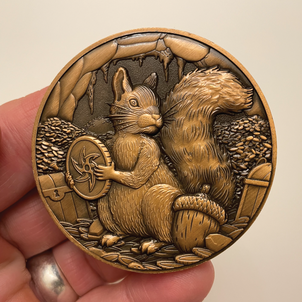 Front-of-Squirrel-Goliath-Coin-in-hand.png