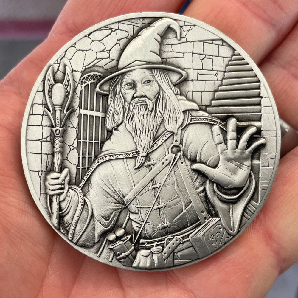 Front of Wizard Goliath Coin in hand.png