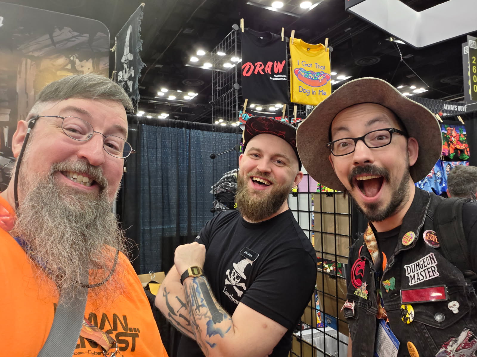 L to R - Egg Embry, Zac Goins, and Tiger Wizard aka Andrew Bellury at Gen Con 2025.jpg