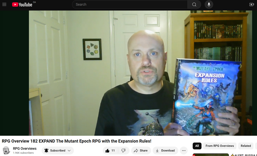 RPG-Overviews-Expansion-Rules-YouTubeReview-Nov2024-Brandon-holdingXR-book.jpg