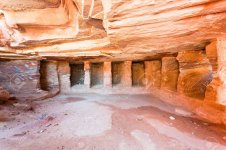 13096026-interior-of-ancient-tomb-or-dwelling-in-sandstone-cave-in-petra-jordan.jpg