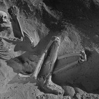 dark-power-trapped-in-rock-as-skeleton.jpg