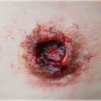 bullet_wound_cu_by_jessicatpaintsfaces-d3brlkv.jpg