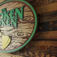Broken Token Logo on Wall.jpg