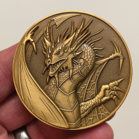 Front-of-Dragon-Goliath-Coin-in-hand.png