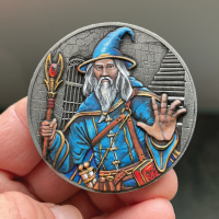 Front-of-Wizard-Goliath-Coin-in-hand-painted.png