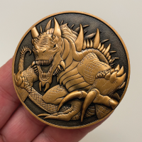 Front-of-Tarrasque-Goliath-Coin-in-hand.png