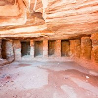 13096026-interior-of-ancient-tomb-or-dwelling-in-sandstone-cave-in-petra-jordan.jpg